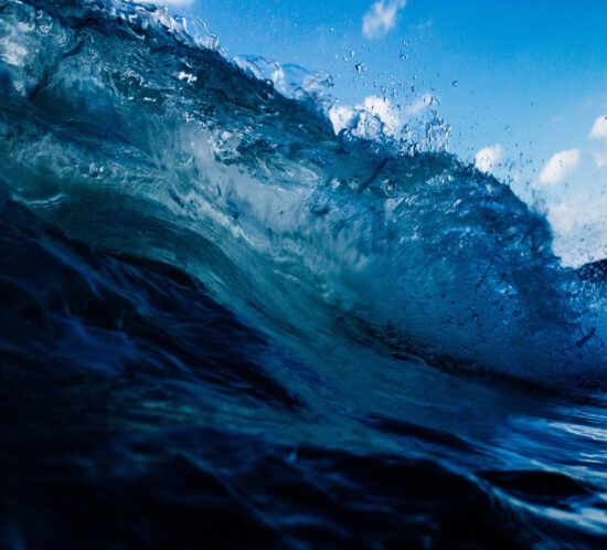 a wave in the blue ocean